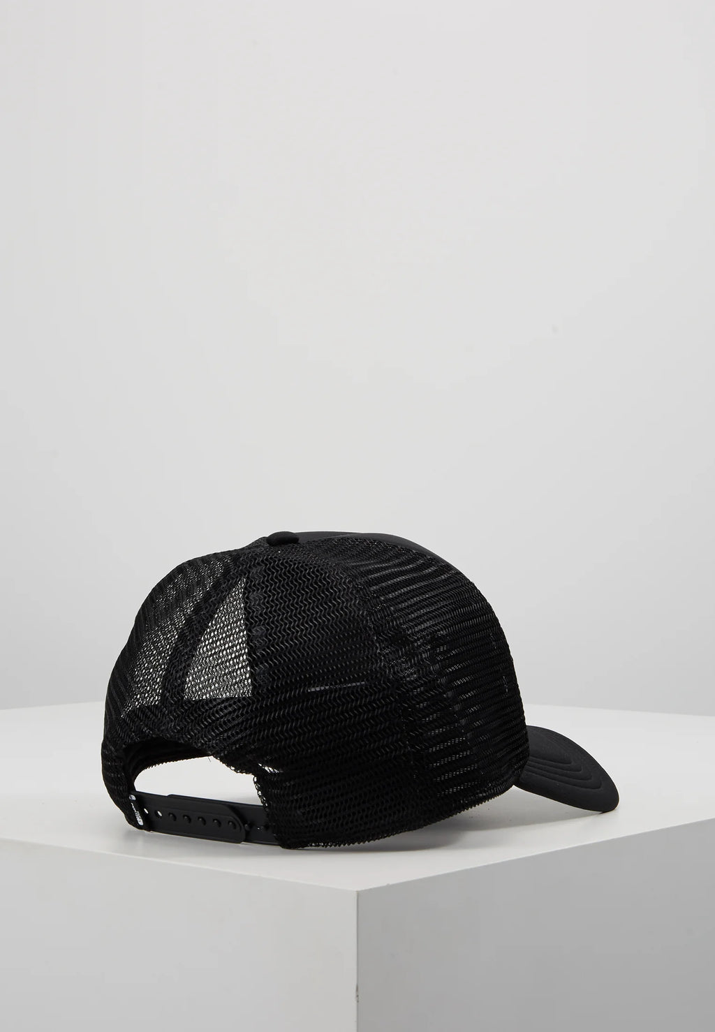 The North Face TNF Logo Trucker Cap in black and white.